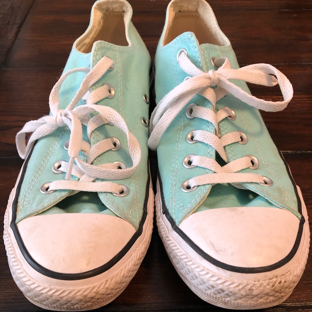 Teal chucks.